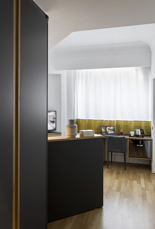 desk space detail classic single room with french bed hotel plaza opera